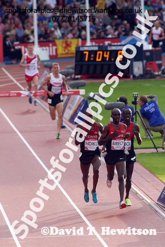Jonathan Ndiku, Jairus Birech and Ezekiel Kemboi Cheboi (all Kenya) lead the 3000 metres steeplechase at the Commonwealth Games, Glasgow. Photo: David T. Hewitson/Sports for All Pics
